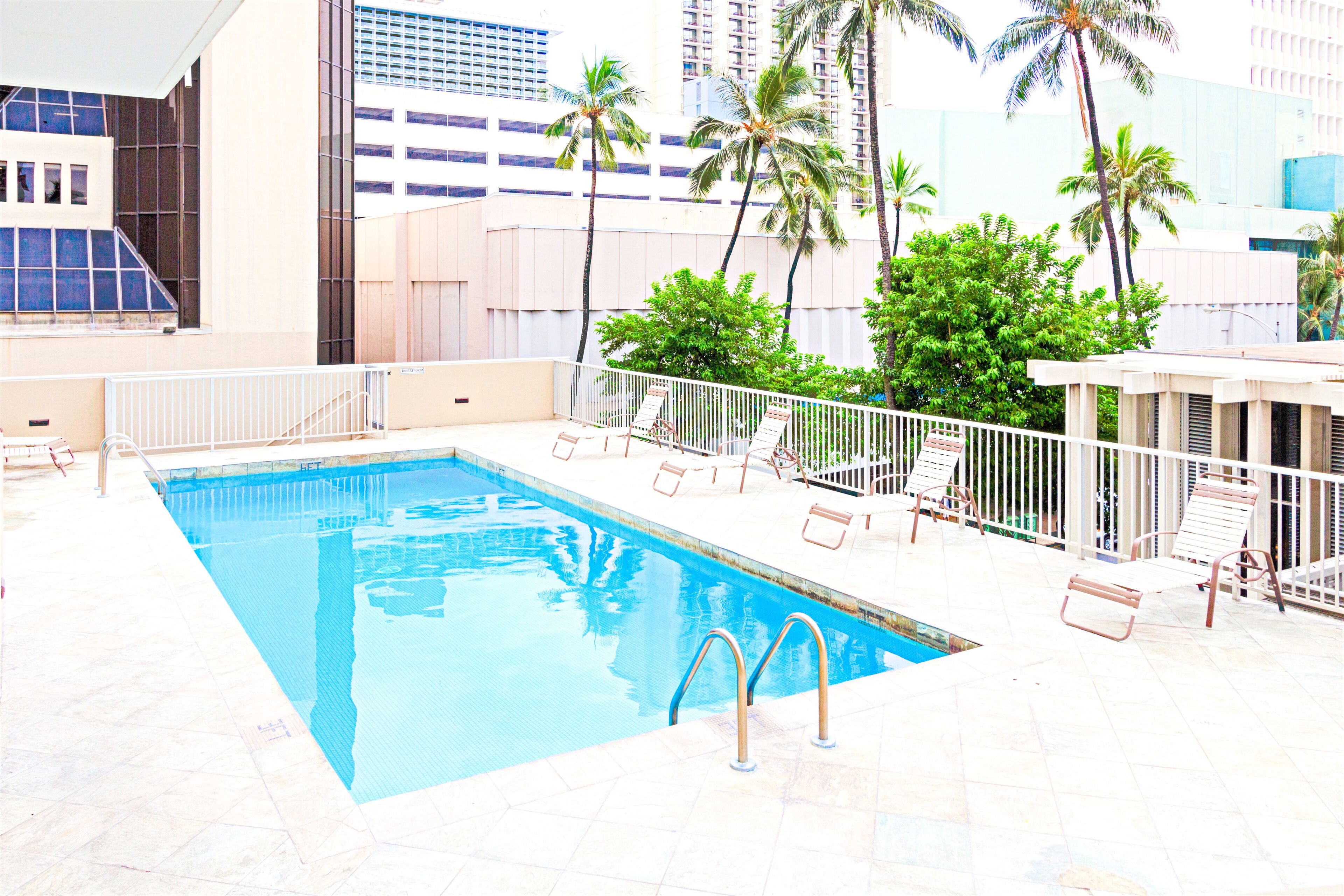 outdoor pool, open 9:00 am to 7:00 pm, pool loungers