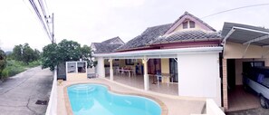 A residential property with a swimming pool, a covered patio, and a garage. - Sawasdee Rawai Phuket (Rawai)