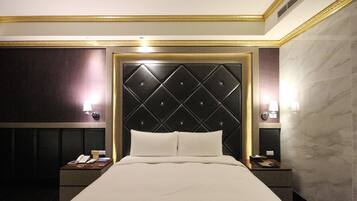 Ropa de cama de alta calidad y minibar