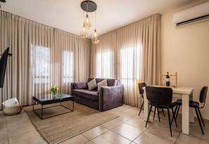 Luxury Suite, Jetted Tub | Living area | Flat-screen TV - Grand Vista Boutique Hotel And Spa (Mevoot HaHermon)