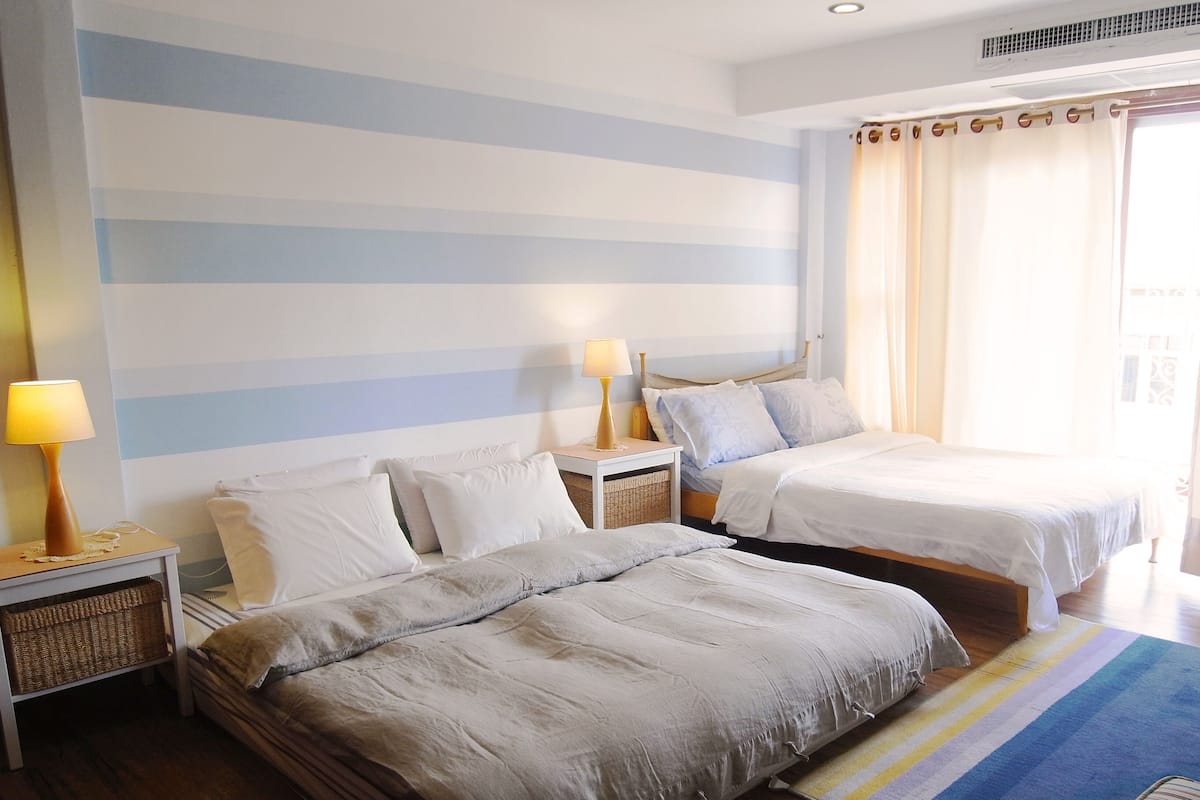 Premium bedding, down comforters, desk, laptop workspace