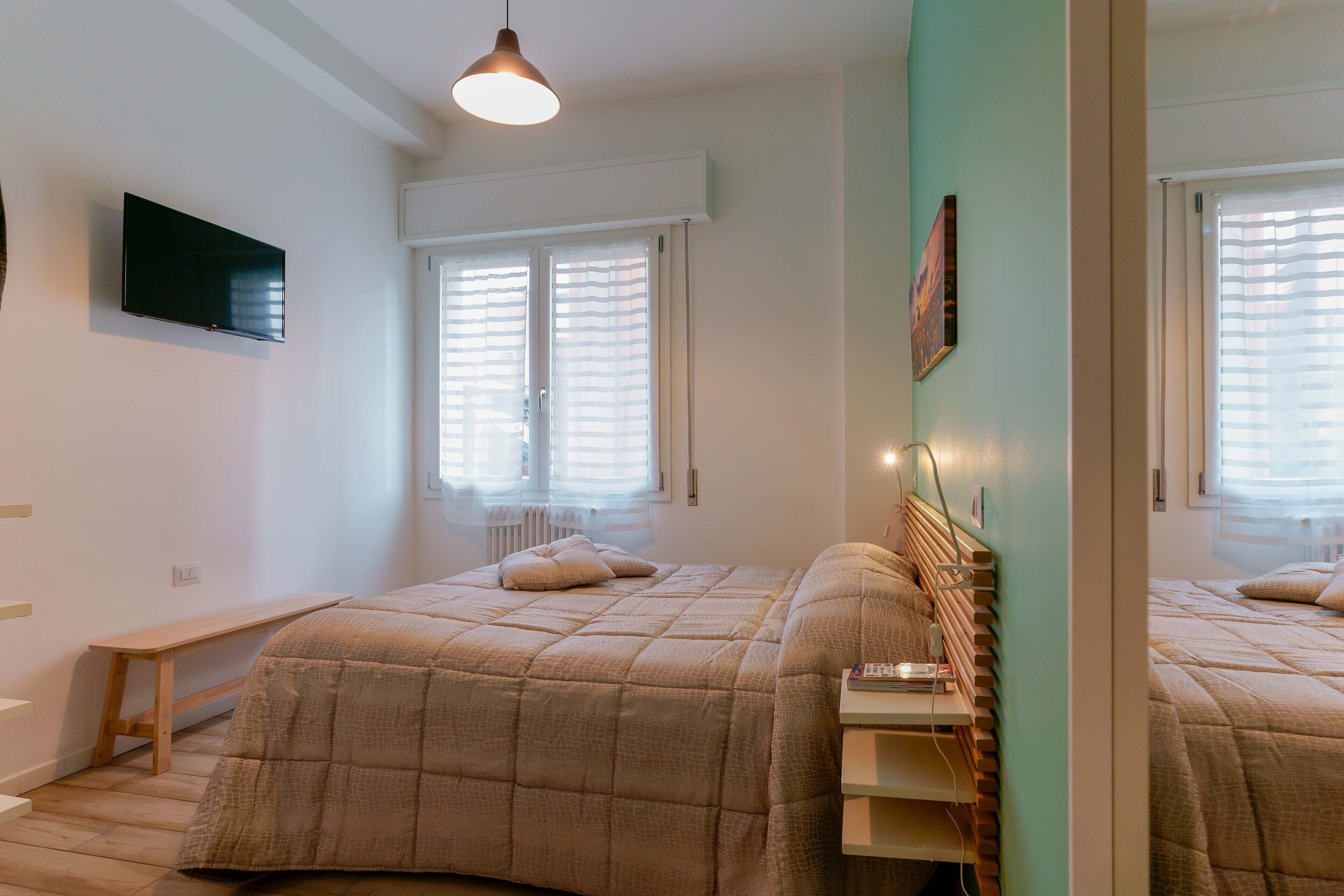 Couette en duvet d'oie, fer et planche à repasser