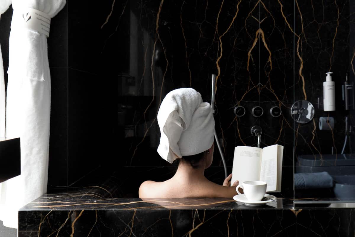 executive suite | bathroom | designer toiletries, hair dryer, bathrobes, slippers