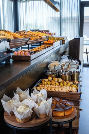 Indulge in a variety of baked goods and pastries at our buffet.