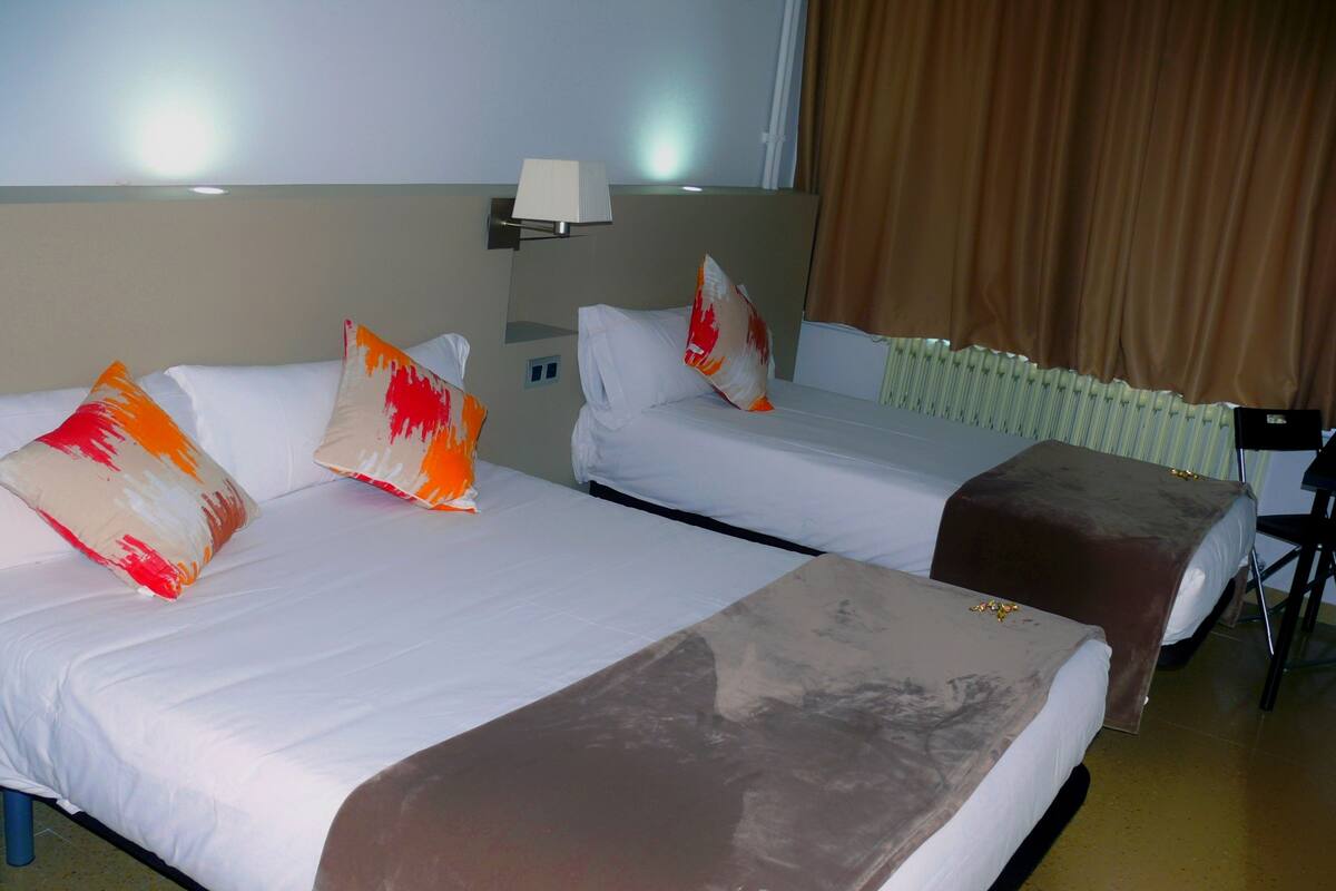 Premium bedding, down duvets, memory-foam beds, desk