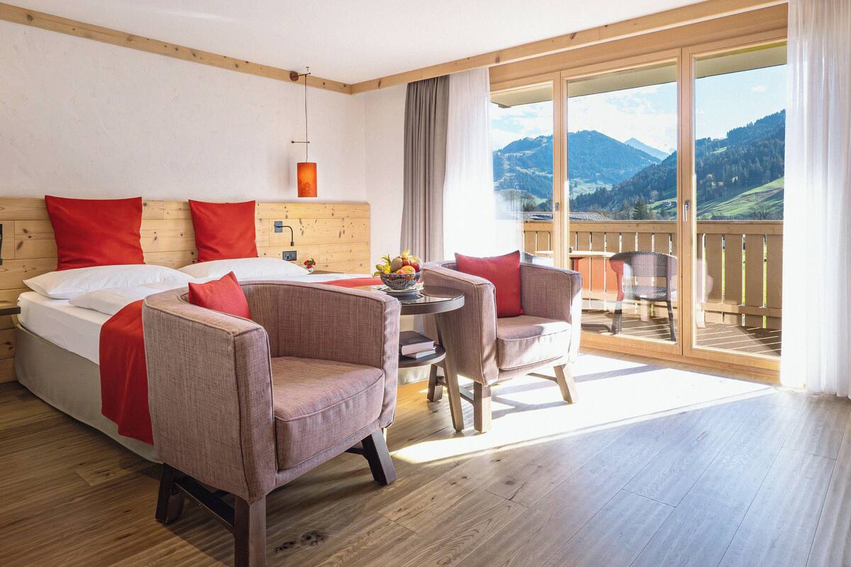 junior suite, balcony, mountain view | premium bedding, down duvets, in-room safe, desk