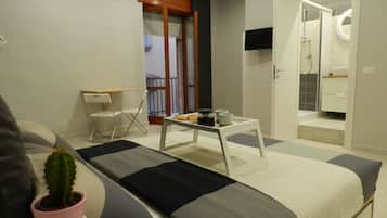 Family Quadruple Room, 1 Bedroom, Ensuite, City View | Desk, soundproofing, free WiFi, bed sheets