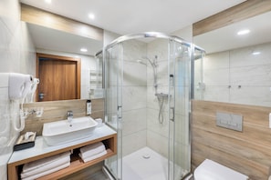 Shower, free toiletries, hair dryer, towels