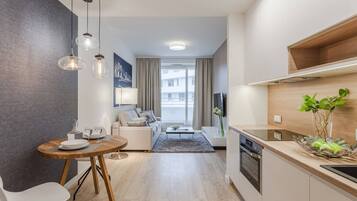 Superior Apartment, 1 Double Bed with Sofa bed | Living room | Flat-screen TV