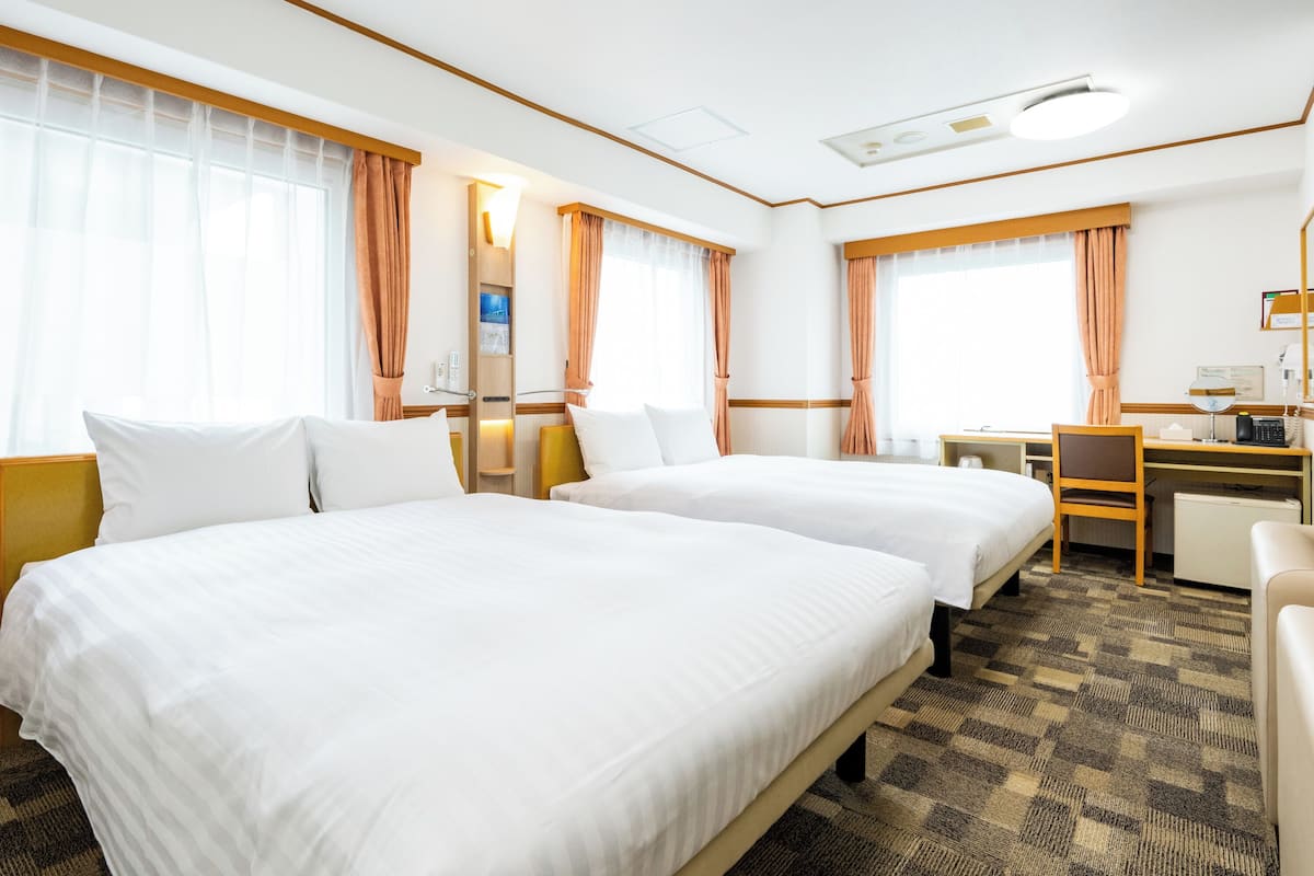 Desk, blackout curtains, free WiFi, bed sheets