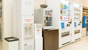 A vending machine with a water dispenser and a trash bin. - Toyoko Inn Yonago Ekimae (Yonago)