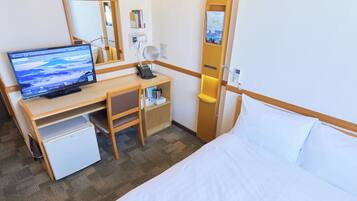 Desk, blackout drapes, WiFi (free), bed sheets