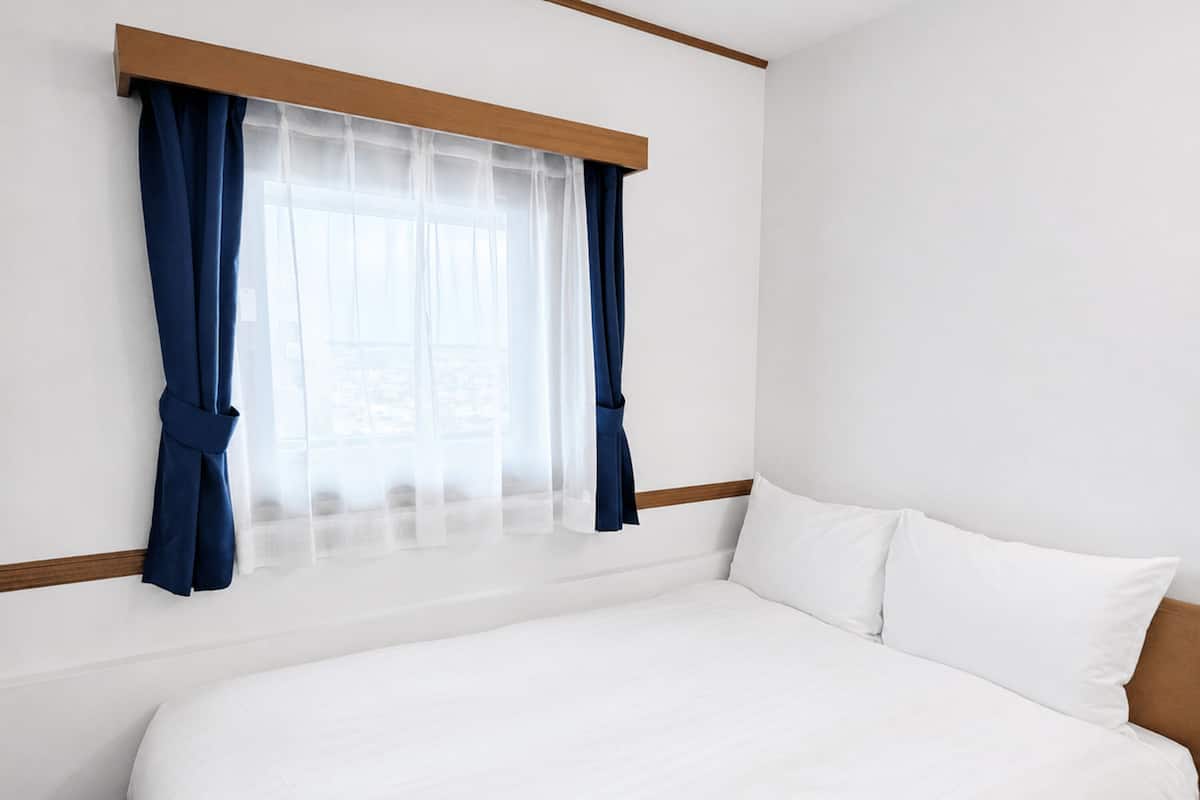 Desk, blackout curtains, free WiFi, bed sheets