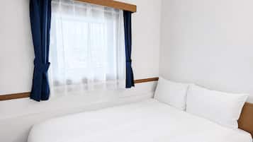 Desk, blackout curtains, free WiFi, bed sheets