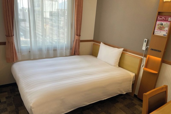 Desk, blackout drapes, iron/ironing board, bed sheets