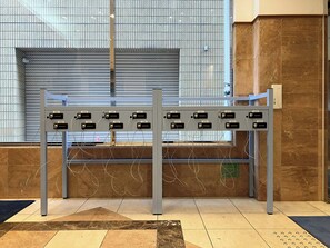 A security checkpoint with numbered gates and a metal barrier. - Toyoko Inn Shin-osaka Chuo-guchi Shinkan (Osaka)