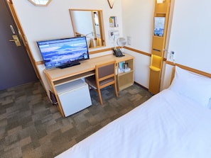 Desk, laptop workspace, free WiFi, bed sheets