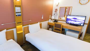Desk, laptop workspace, bed sheets