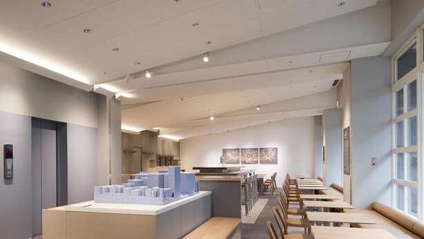 A modern restaurant with a long counter, cushioned seating, and a clean, minimalist design. - Toyoko Inn Tokyo Haneda Kuko No.2 (Tokyo)