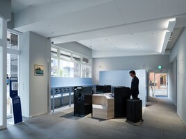 Check-in/check-out kiosk