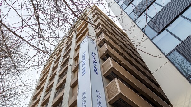 A multi-story building with a modern architectural design, featuring balconies and large windows. - Toyoko Inn Kumamoto Sakuramachi Bus Terminal Mae (Kumamoto)