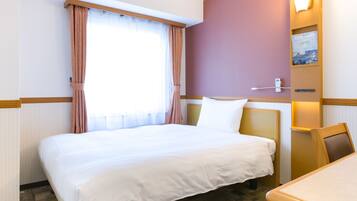 Desk, free WiFi, bed sheets