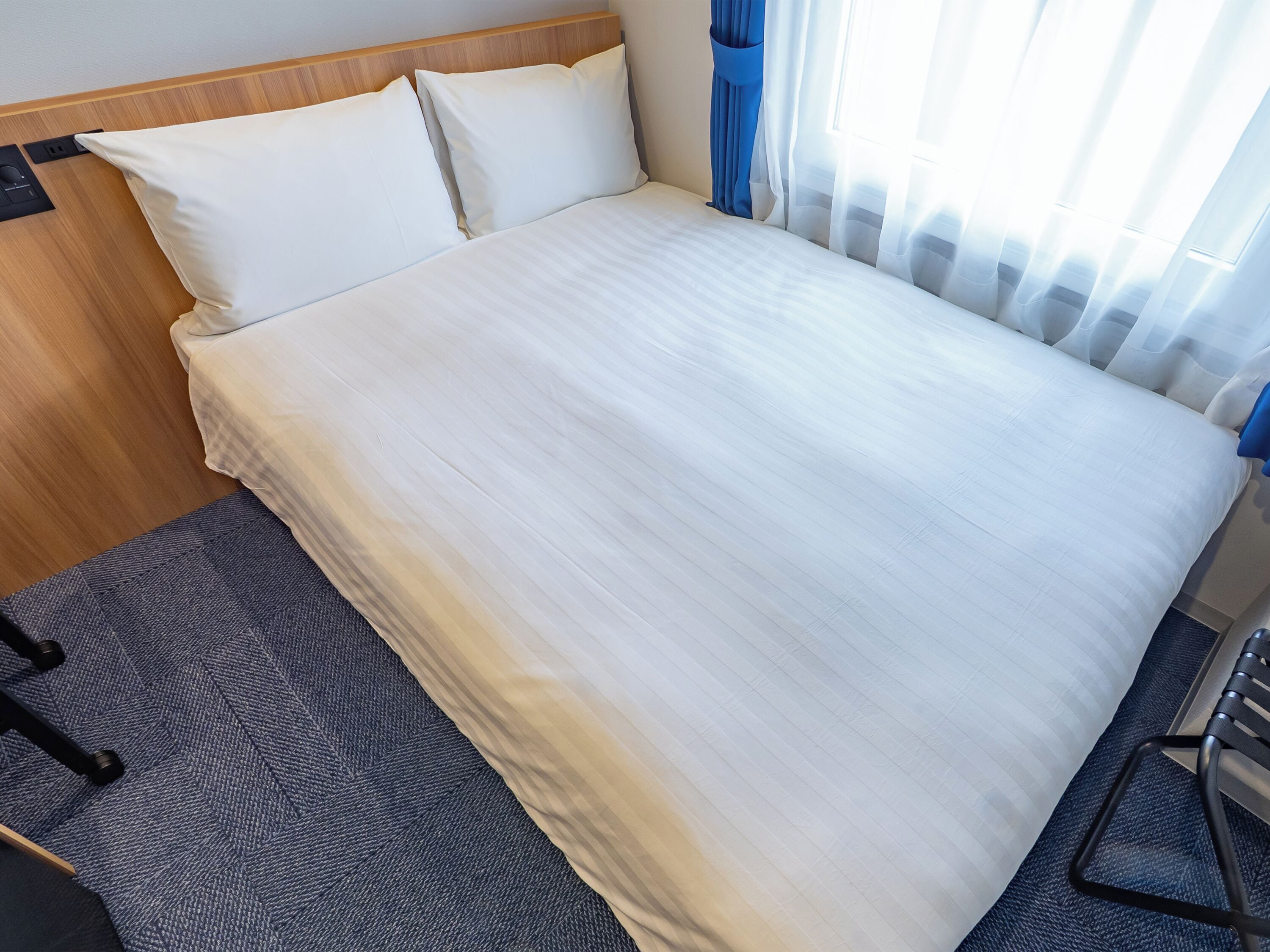 Down duvets, desk, blackout curtains, iron/ironing board