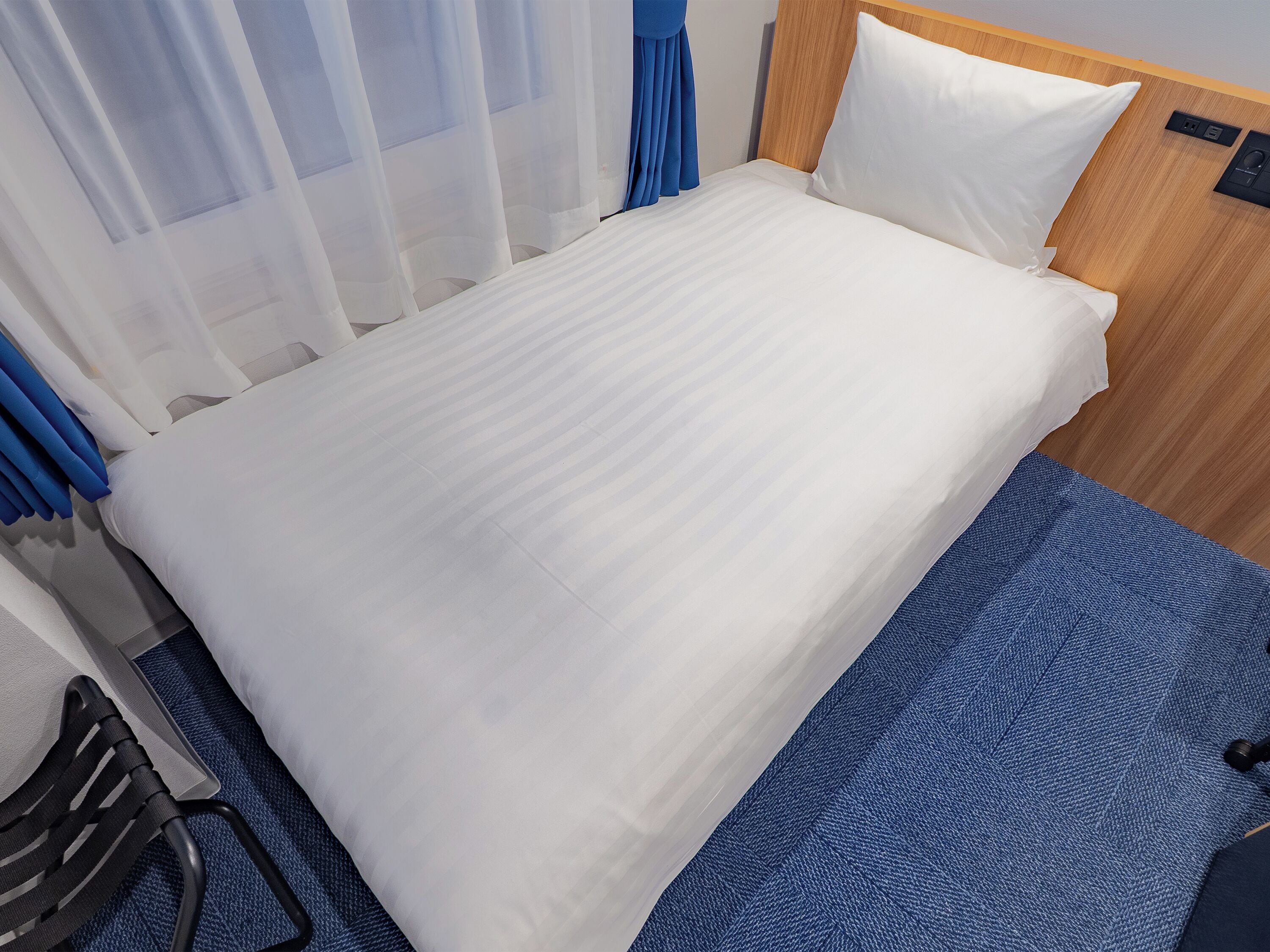 Down duvets, desk, blackout curtains, iron/ironing board