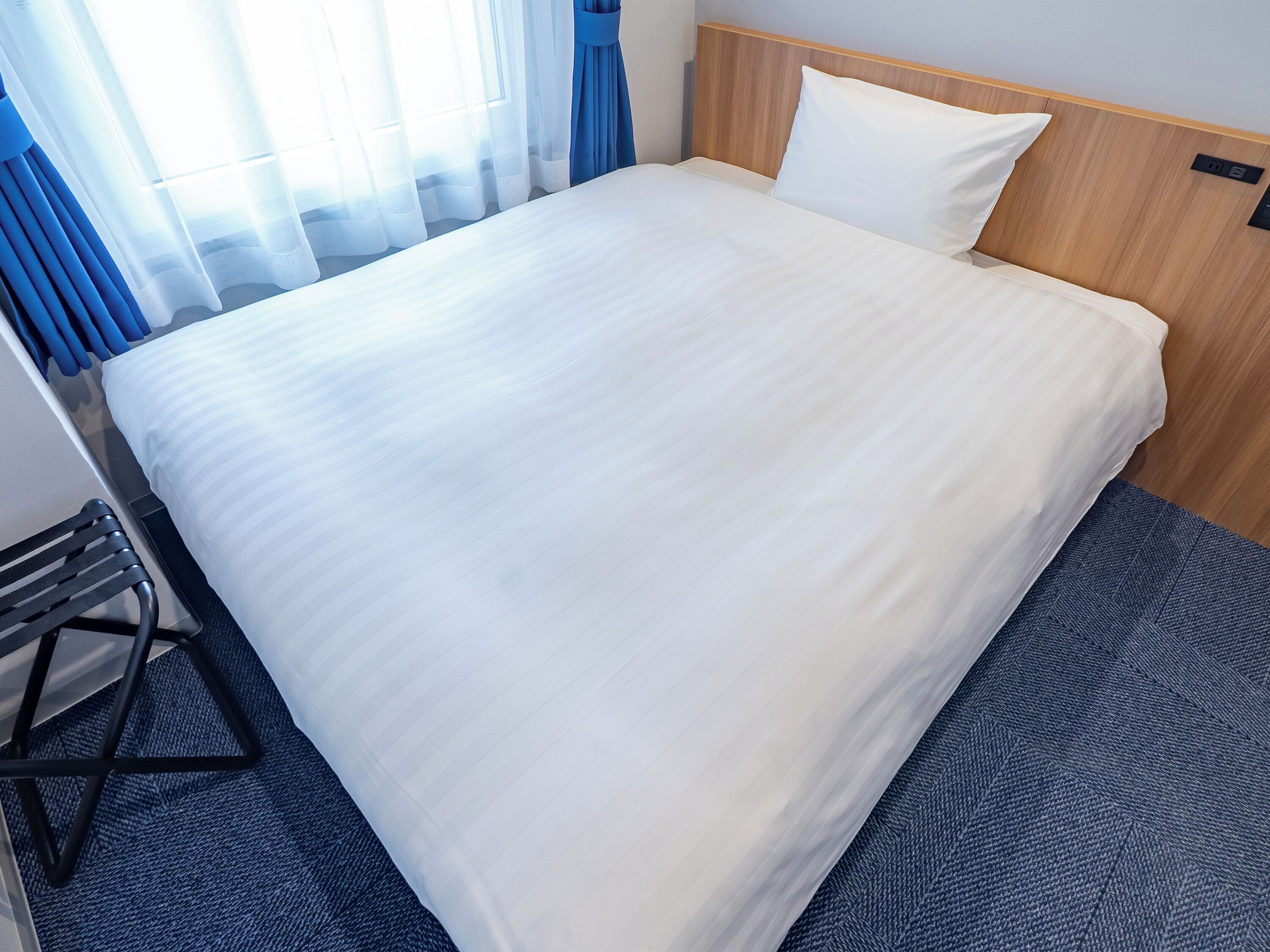 Down duvets, desk, blackout curtains, iron/ironing board