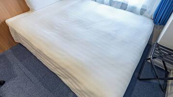 Down duvets, desk, blackout curtains, iron/ironing board