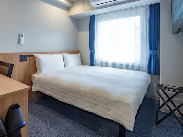 Down duvets, desk, blackout curtains, iron/ironing board