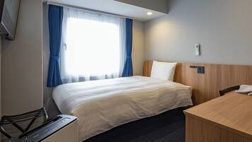 Down comforters, desk, blackout drapes, iron/ironing board