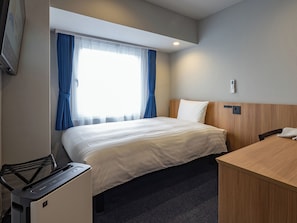 Down duvets, desk, blackout curtains, iron/ironing board