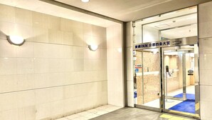 A hotel entrance with a sign indicating 'INN Kyoto' and an AED symbol. - Toyoko Inn Kyoto Shijo-omiya (Kyoto)