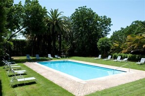 Outdoor pool, pool umbrellas, pool loungers