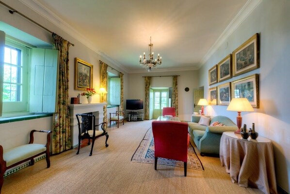 Superior Suite | Living room | Flat-screen TV