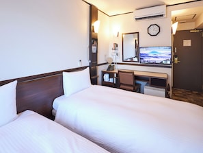 Desk, blackout curtains, iron/ironing board, WiFi