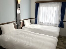 Desk, laptop workspace, free WiFi, bed sheets