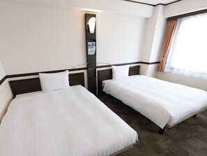 Desk, laptop workspace, free WiFi, bed sheets