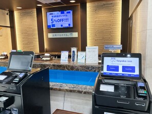 Check-in at our reception area, where you can select your room and make contactless payments.