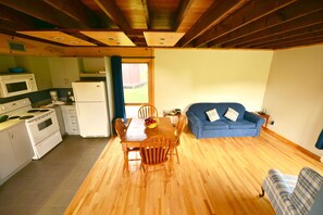 Chalet, 2 Bedrooms (Tube Sliding Zone/Mountain Bike Trails in Summer) | Living area - Station touristique Pin Rouge (Rivière-Bonaventure)