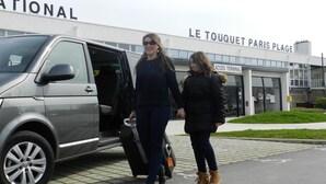 A van parked in front of a building with a sign reading "LE TOUQUET PARIS PLACE." - Résidence Chez Gino (Etaples)
