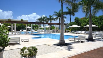 2 outdoor pools, open 8:00 AM to 10:00 PM, pool umbrellas, pool loungers