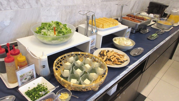 A buffet with various food items including salads, tofu, and other dishes. - Toyoko Inn Kagoshima Chuo Station Higashi (Kagoshima)