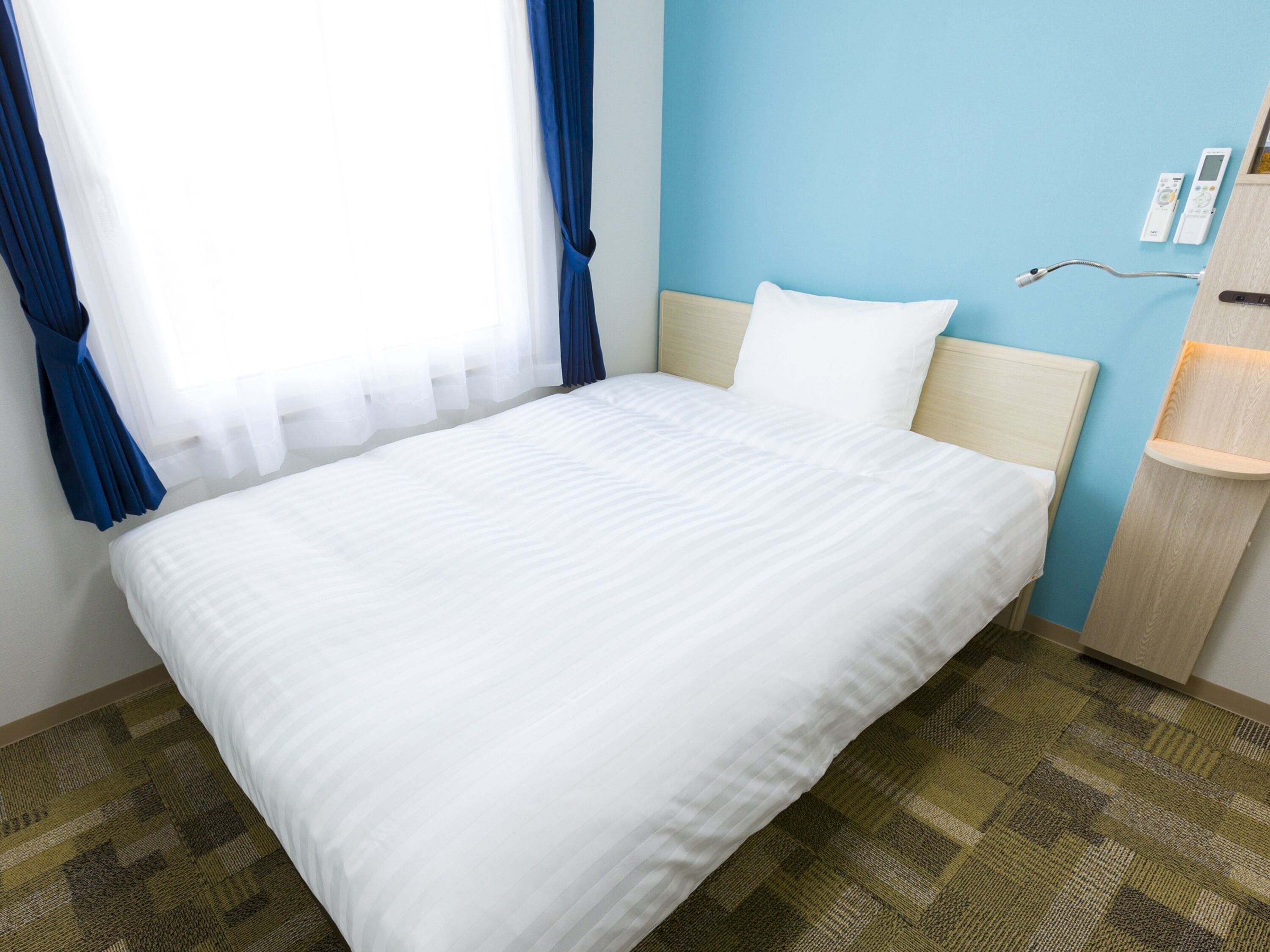 premium bedding, desk, blackout curtains, iron/ironing board