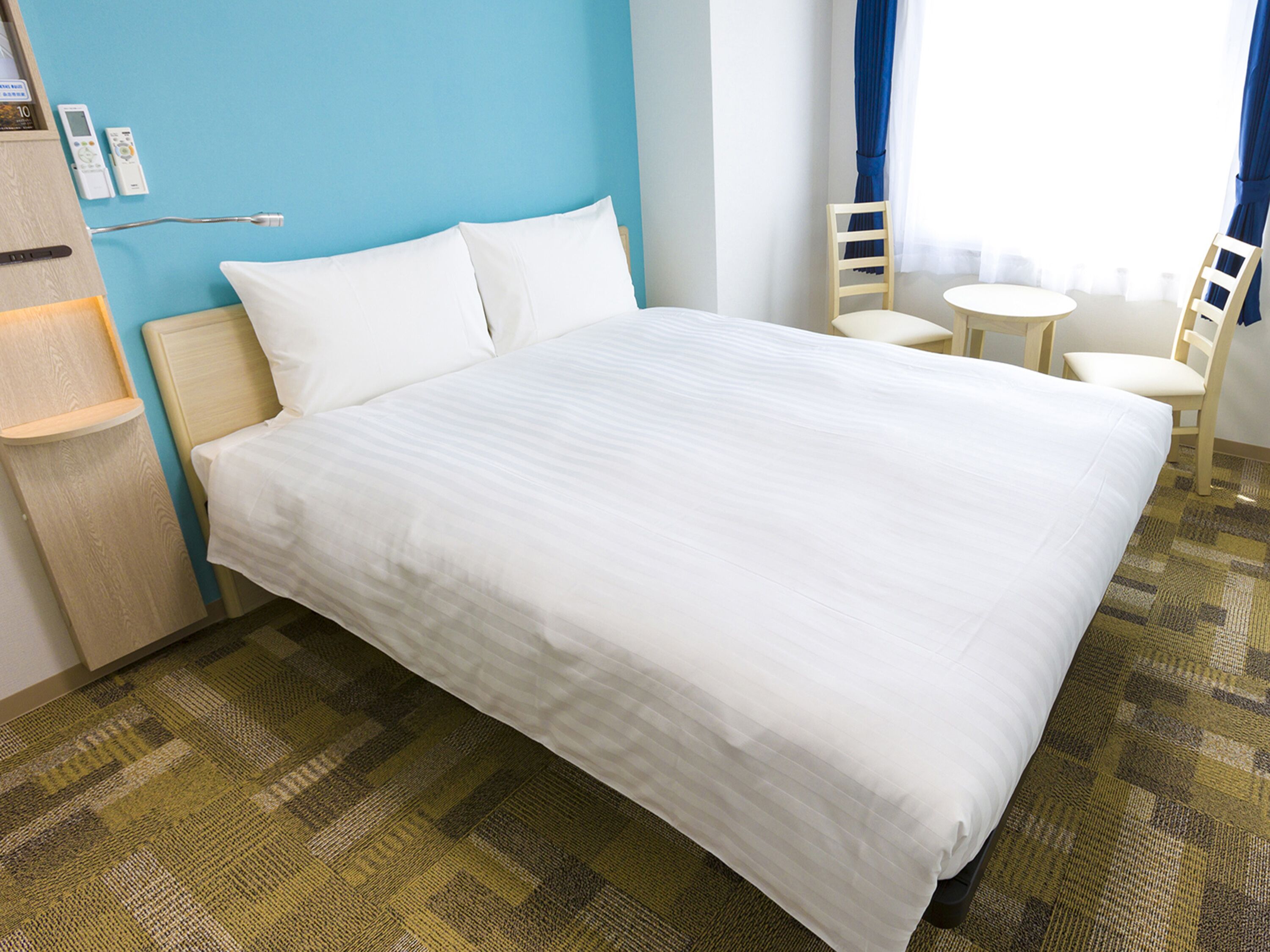 premium bedding, desk, blackout curtains, iron/ironing board