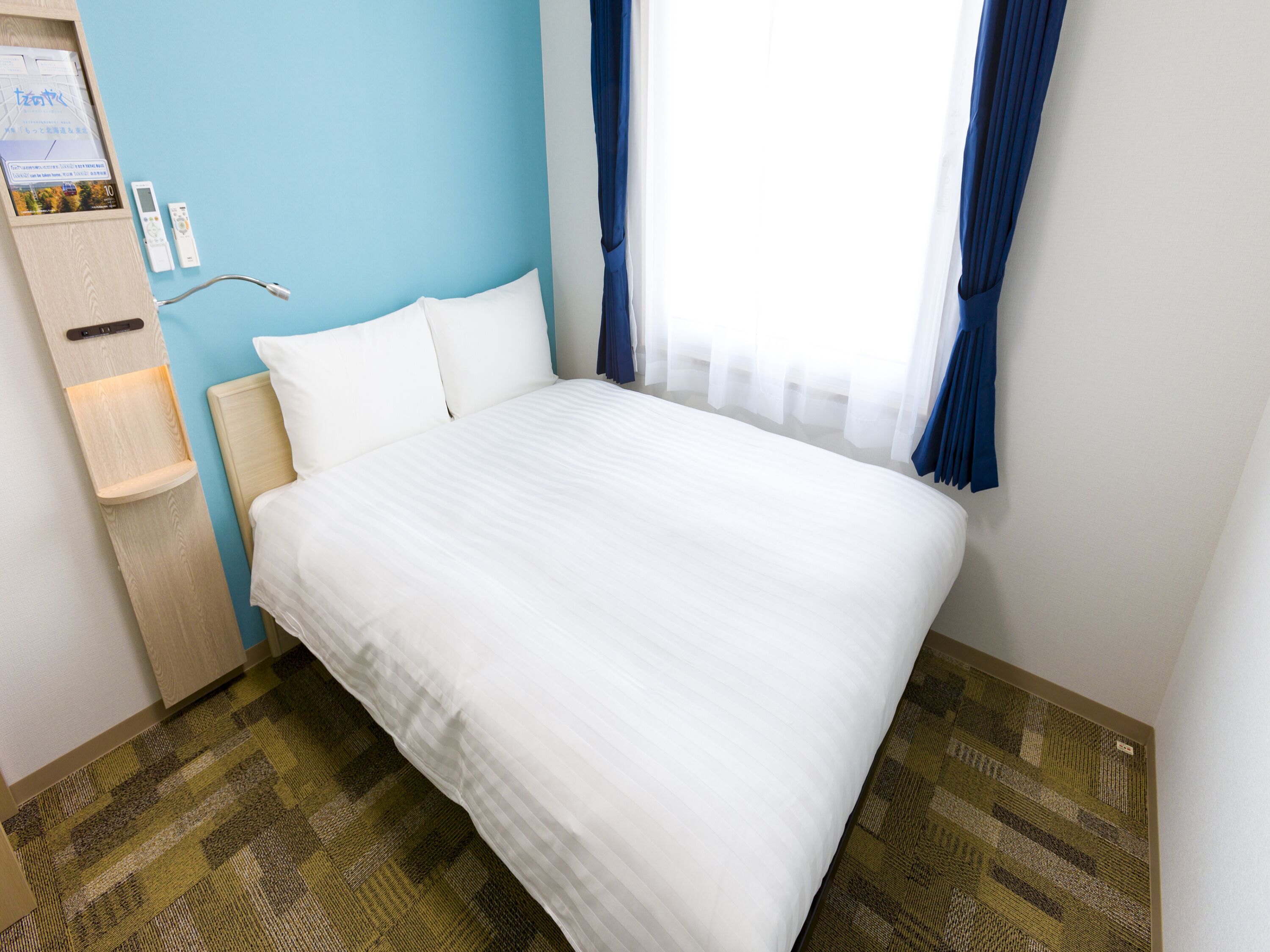 premium bedding, desk, blackout curtains, iron/ironing board