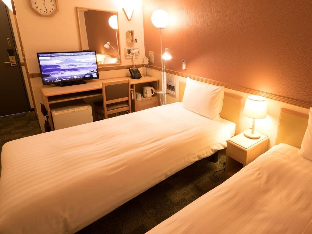 Desk, laptop workspace, free WiFi, bed sheets