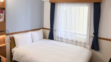 Desk, laptop workspace, free WiFi, bed sheets