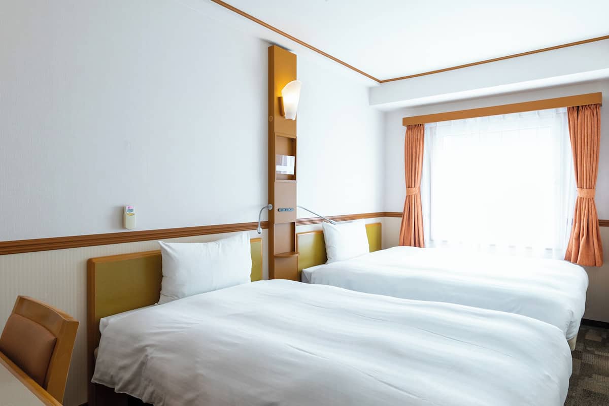 Standardzimmer, Mehrere Betten, Nichtraucher | Schreibtisch, Verdunkelungsvorhänge, Bügeleisen/Bügelbrett